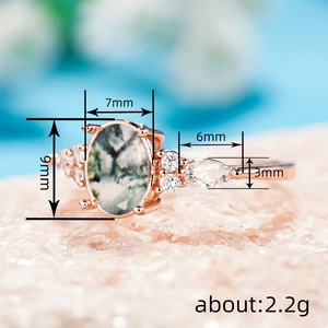 Rose gold marquise ring with moss agate and cubic zirconia on pink crystal stone