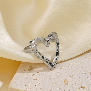 Irregular heart-shaped stainless steel open ring with silver hammered texture design
