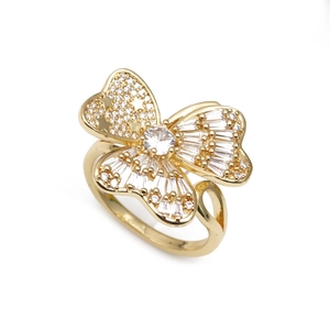 Adjustable golden butterfly ring for women featuring white zircon stones and hollow star wing