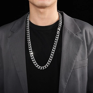 Polished 14mm titanium steel Cuban link chain necklace for men on black background