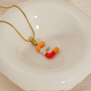 Golden titanium steel chain with colorful orange and white letter E pendant