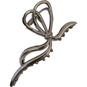 Elegant large silver metal butterfly hair claw clip for thick hair on white background