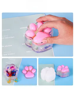 Detail of cat paw silicone mold and finished iridescent resin storage box for jewelry