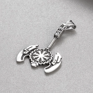Detailed view of stainless steel Viking axe pendant featuring intricate Norse rune carvings