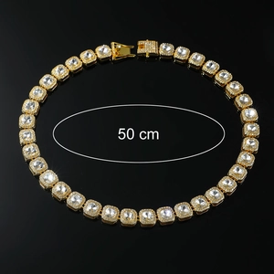 Close-up of a 50cm hip hop style gold square link necklace with clear rhinestones