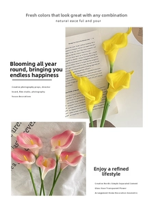 Detail of yellow and pink PU calla lilies showing natural texture on vintage book props