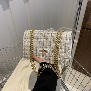White and gold tweed small square bag with chain strap and gold twist-lock closure