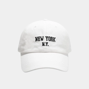 Close-up of black NEW YORK N.Y. embroidery on white cotton twill baseball cap
