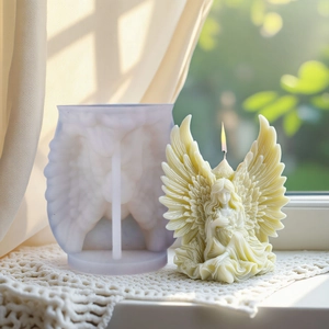 Detailed 3D angel wings silicone candle mold with finished aesthetic wax figure