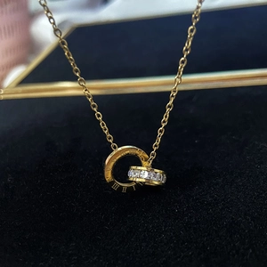 Golden titanium steel double ring necklace with Roman numerals and cubic zirconia inlay