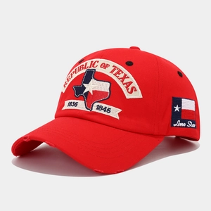 Detail of red distressed Republic of Texas baseball cap with vintage 1836 1845 embroidery