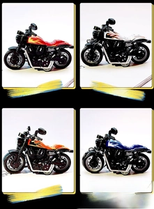 Detail view of four colorful mini motorcycle keychains with creative flame patterns