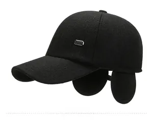 Detail view of winter baseball cap with ear flaps and wool texture in black