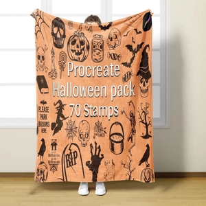 Macro detail of Halloween flannel blanket featuring black ink pumpkin and ghost illustrations