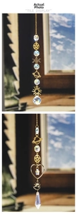 Detail of galaxy star and moon suncatchers with crystal beads and gold metal charms