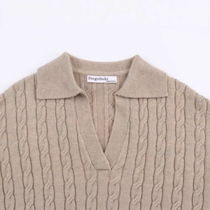 Classic beige cable knit polo sweater with V-neck collar and ribbed texture design