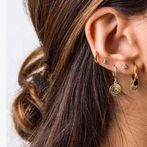 Golden Evil Eye hoop earrings set for women featuring minimalist round totem pendants