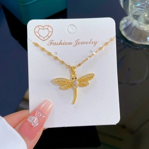Elegant gold hollow dragonfly necklace with micro-pave zircons and teardrop pendant