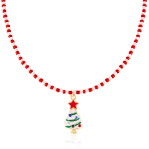 Detail view of a golden Christmas tree pendant with rhinestones on a red and white beaded chain