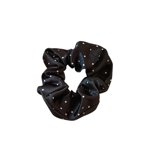 Satin black scrunchie with white polka dots for high ponytails and elegant hair styling