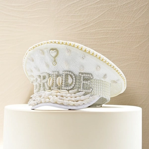 White military captain hat with BRIDE lettering sequins and sea shells for beach weddings