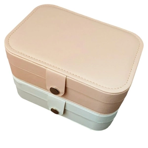 Portable double-layer faux leather jewelry organizer with snap button closure in pink and white