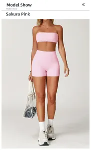 Detail of cherry blossom pink yoga set with high-waist shorts and sports tube top