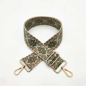 Ethnic style woven shoulder strap with geometric patterns and adjustable gold metal buckles