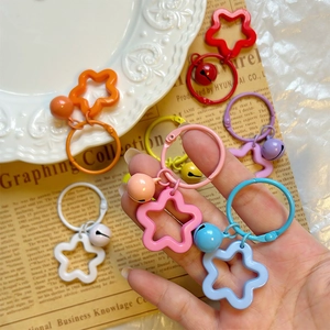 Colorful star-shaped acrylic metal keychains with bells for bags and earphone cases