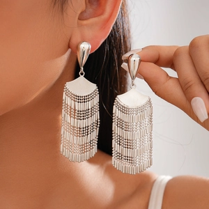 Silver multi-layer beaded tassel earrings showing metallic drape and elegant long design