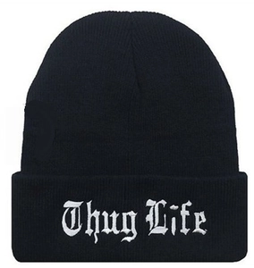 Detail shot of white Thug Life gothic embroidery on black knit beanie cuff
