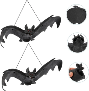 Realistic black rubber Halloween bats with red eyes and fine wings texture detail
