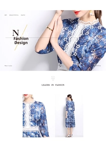 Detail of blue and white lace dress with floral embroidery and hollow out lace trim