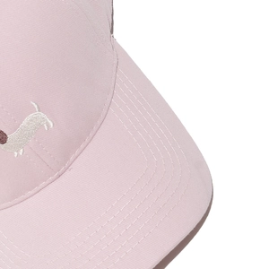 Close-up of pink baseball cap with detailed dachshund embroidery and neat stitching