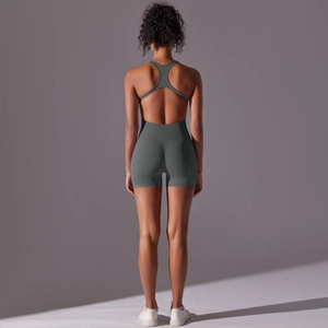 Detail of the racerback design and ribbed texture on the back of the yoga unitard