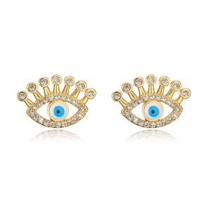 Close-up of golden Evil Eye stud earrings with blue enamel and micro-pave crystals