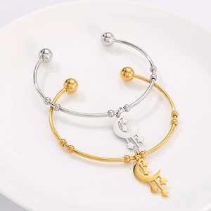 Adjustable moon and star charm bracelets in gold and silver finish stainless steel
