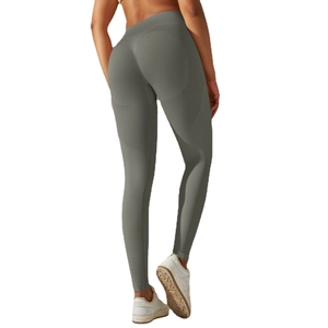 Sage green high-waisted seamless yoga leggings with peach lift effect for fitness