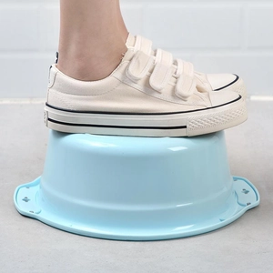 Durable light blue thickened plastic washbasin showing heavy-duty pressure resistance