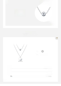 Detail of 925 sterling silver double layer necklace with polished beads and round pendant