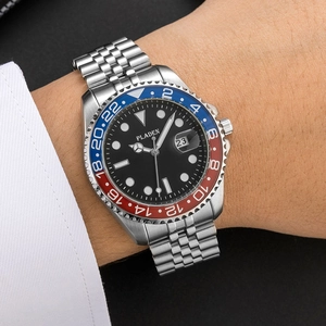 Men's steel watch with black dial and blue-red rotating bezel worn on wrist