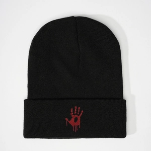 Black knitted beanie hat featuring a red blood handprint embroidery in streetwear style