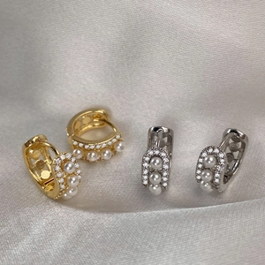 Elegant gold and silver U-shaped hoop earrings with pearls and pavé cubic zirconia