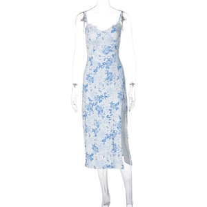 Detail of V-neck lace trim and blue floral print on white summer slip midi dress