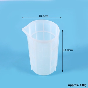 Detail of 700ml silicone measuring cup with clear scale marks and pouring spout