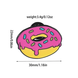 Detail view of pink donut enamel pin showing dimensions 22x30mm and weight 3.4g