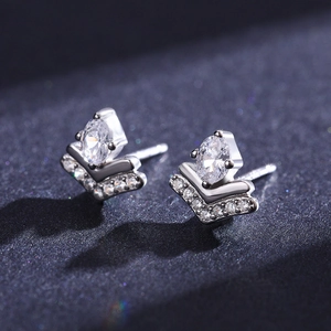 Elegant s925 silver geometric crown earrings featuring sparkling oval and V-shaped crystals