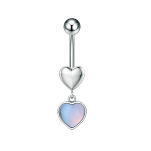 Detail view of silver heart navel piercing with iridescent zircon inlay on white background