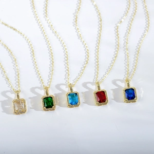 Detailed view of square zircon necklaces in five vibrant gemstone colors with gold chain