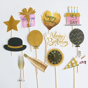 Detailed set of 12 gold and black birthday photo booth props on sticks for parties